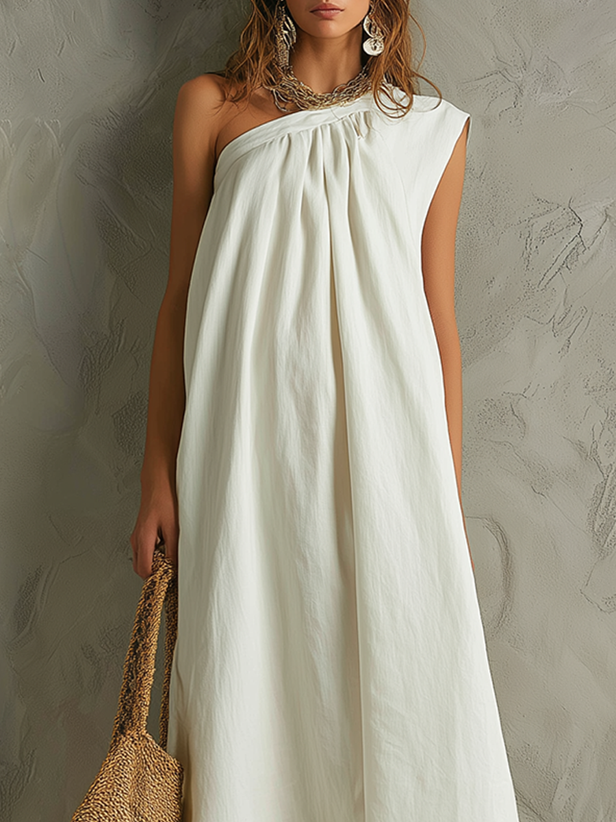 Vestido maxi blanco minimalista con un solo hombro y ambiente de resort