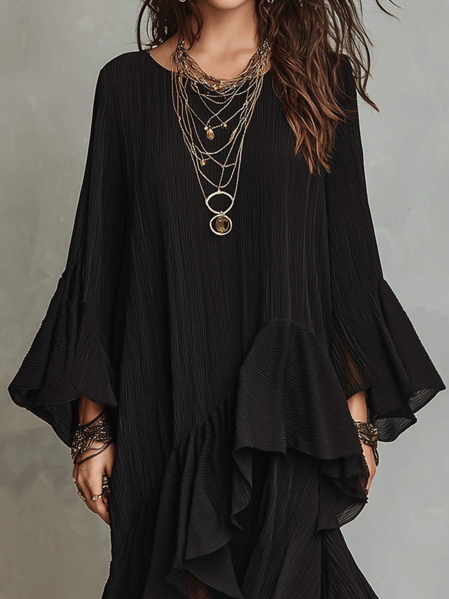 Elegante vestido midi bohemio negro asimétrico con pliegues