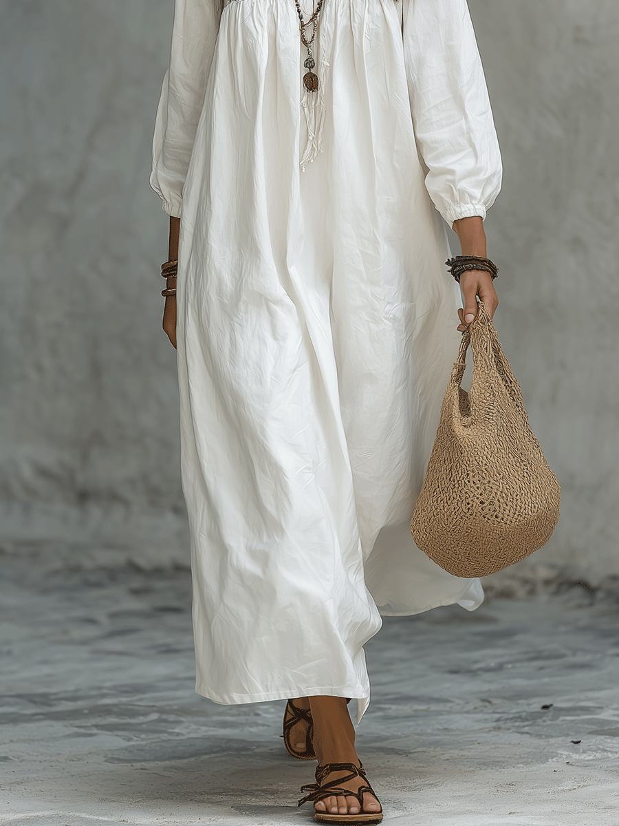 Vestido maxi blanco bohemio con bordado de flores y mangas globo