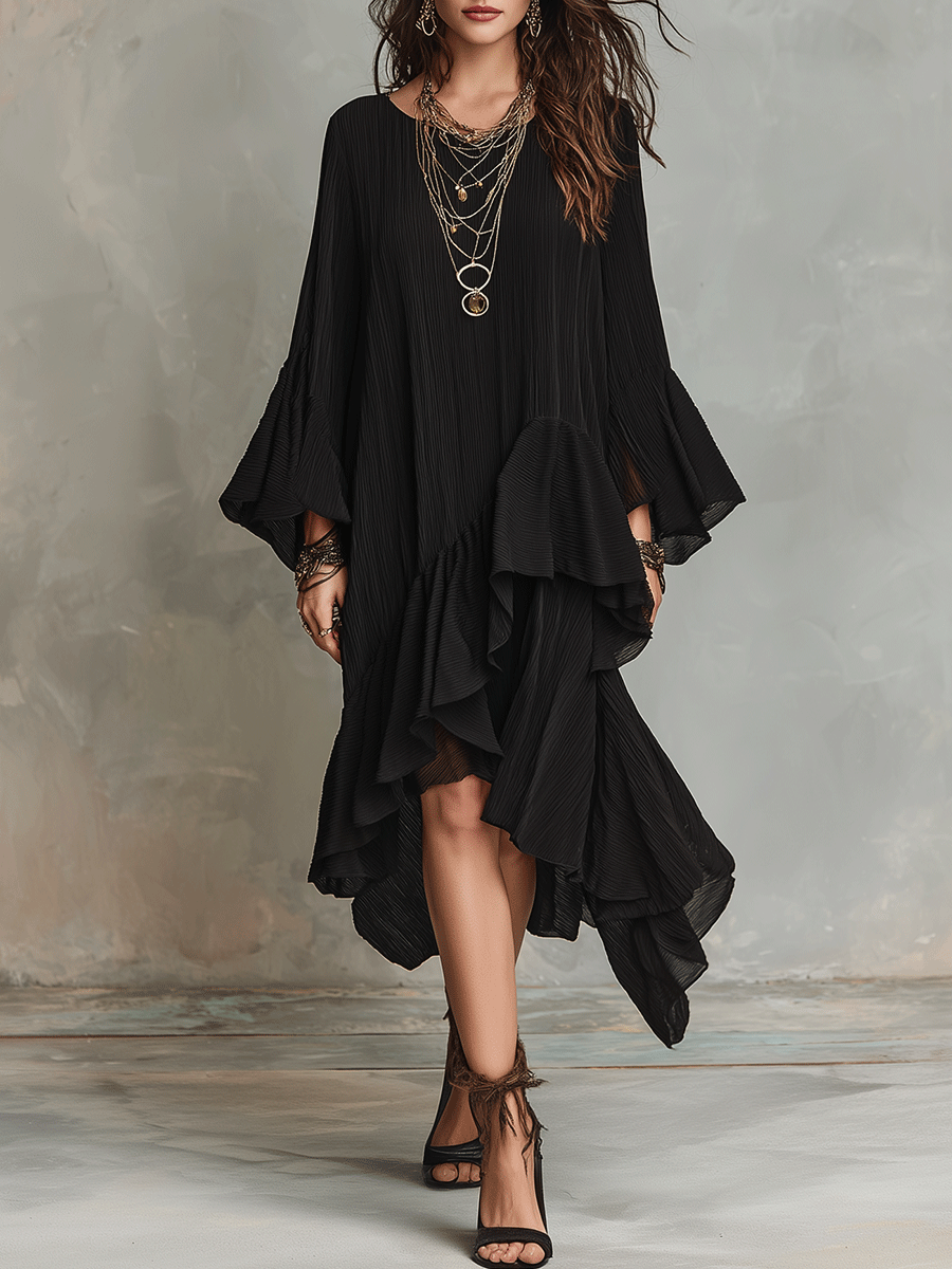 Elegante vestido midi bohemio negro asimétrico con pliegues