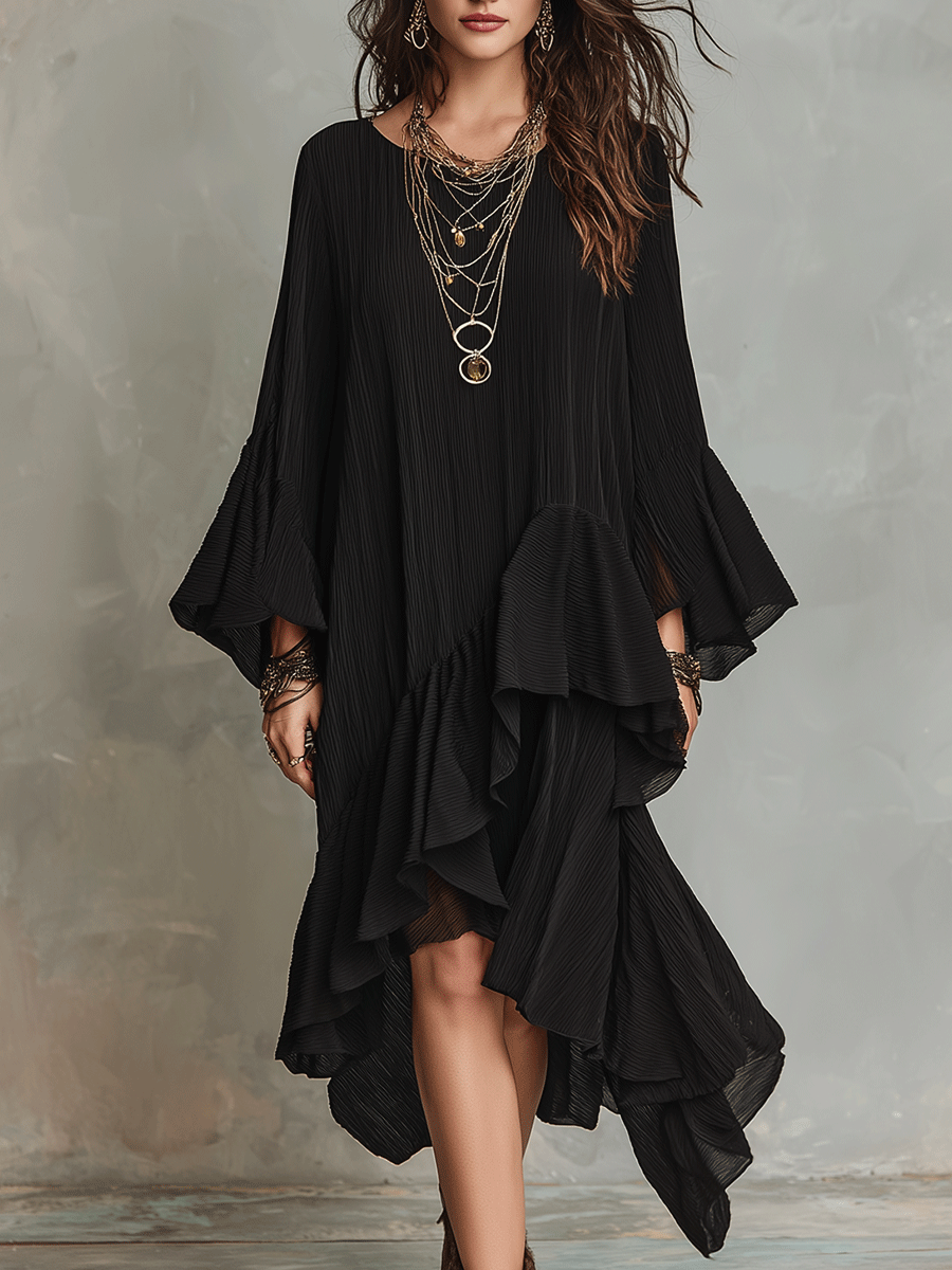 Elegante vestido midi bohemio negro asimétrico con pliegues