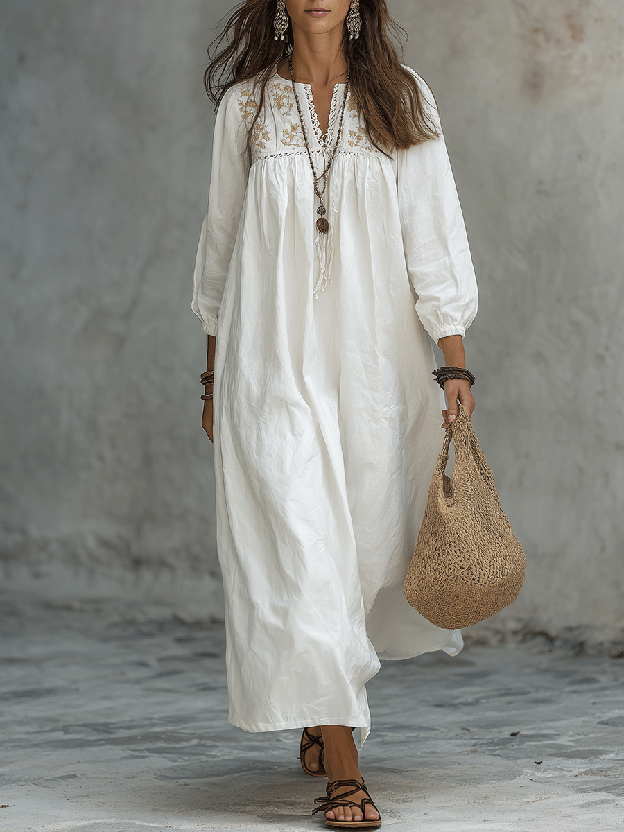 Vestido maxi blanco bohemio con bordado de flores y mangas globo