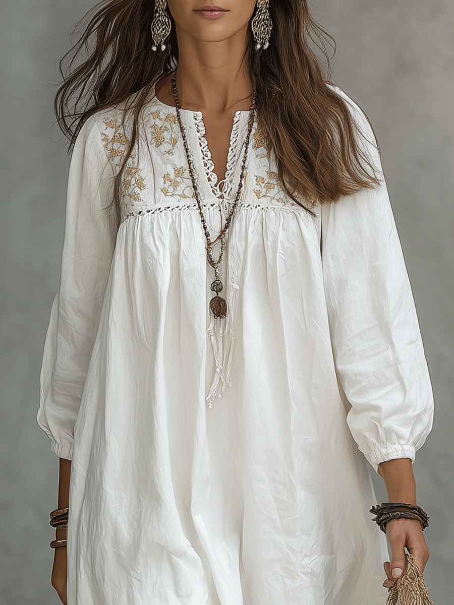 Vestido maxi blanco bohemio con bordado de flores y mangas globo